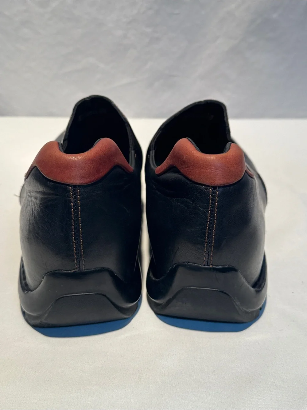 Cole Haan Black Leather Slip-On Loafers with Brown Heel Tab
